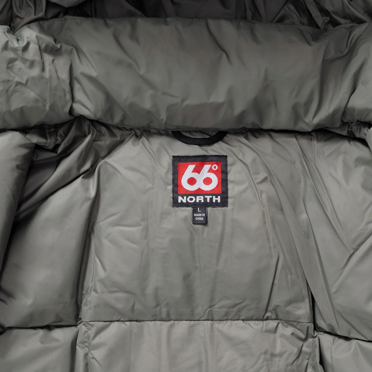 Dyngja Down Jacket - Image 9